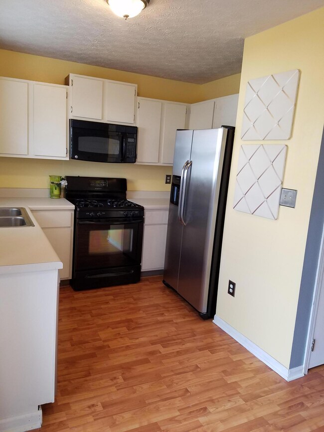 Kitchen with wood laminate flooring