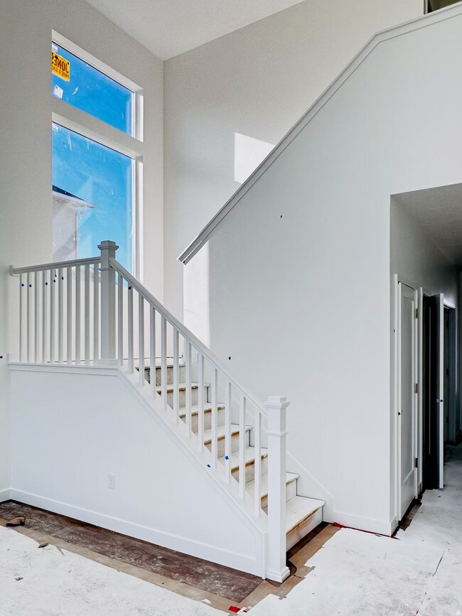 Stairs featuring baseboards