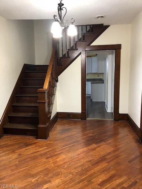 Foyer with staircase leading up to 4 bedrooms and 