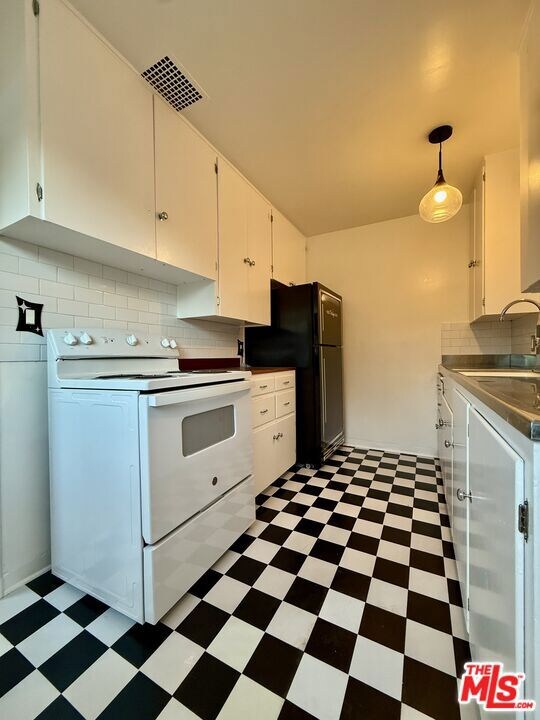 5560 Village Green, Los Angeles, CA 90016 - photo 5