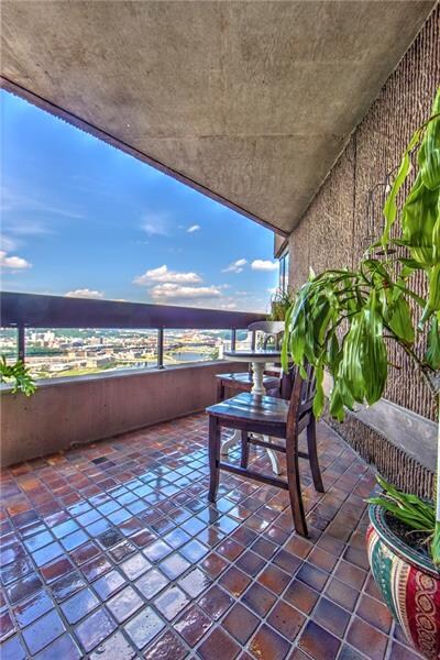 Living room opens onto the patio where you can rel