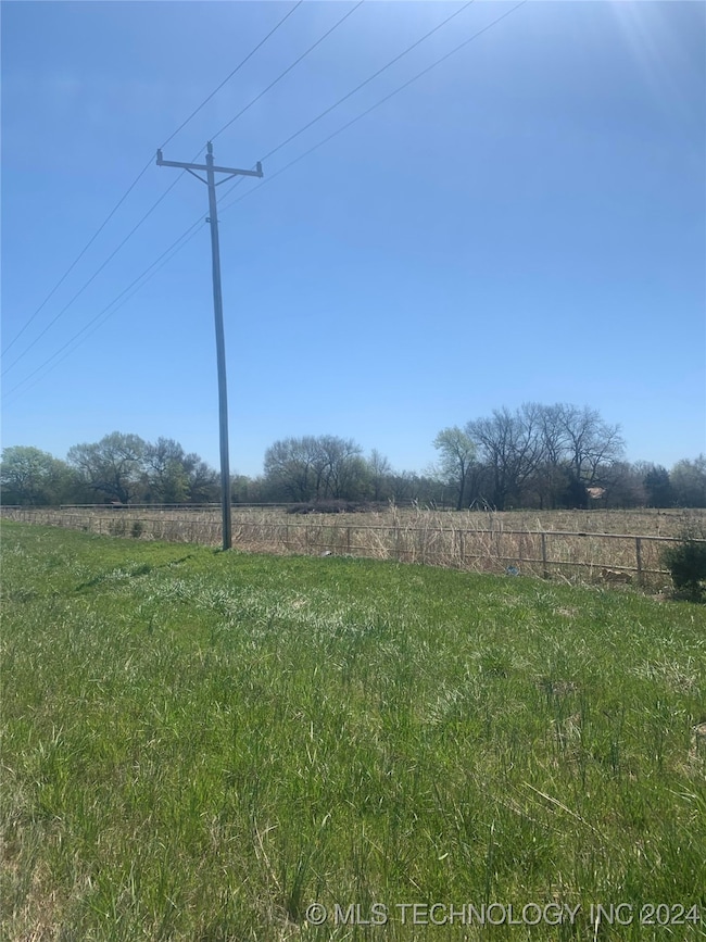 Front View White Cable Fence on Hwy Frontage