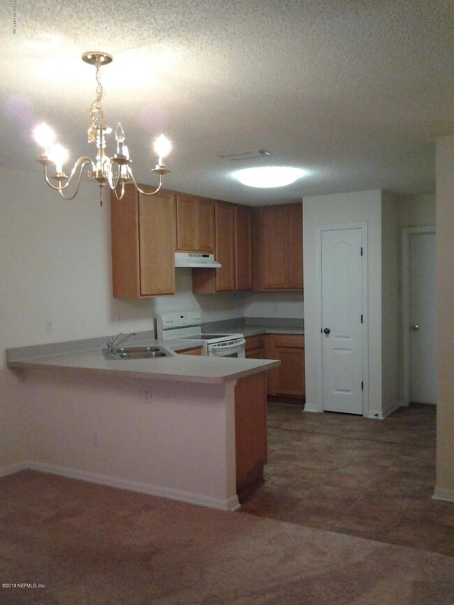 7709 Highchair Ln, Jacksonville, FL 32210 - photo 4