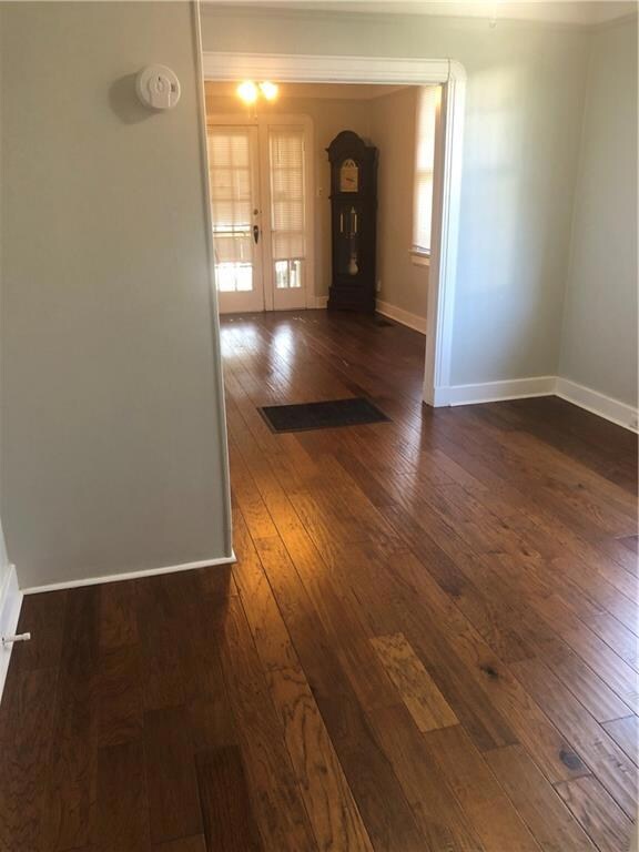 Beautiful wood flooring in Bedroom 1. Easily add c