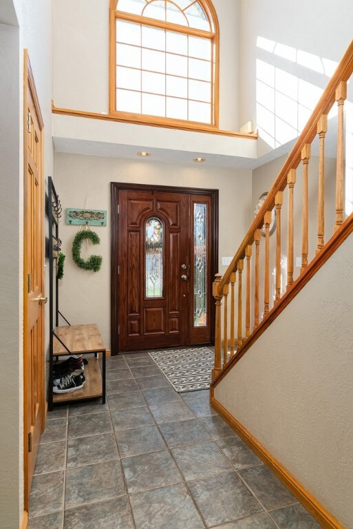 Light and Bright 2 Story entry with a palladium window.