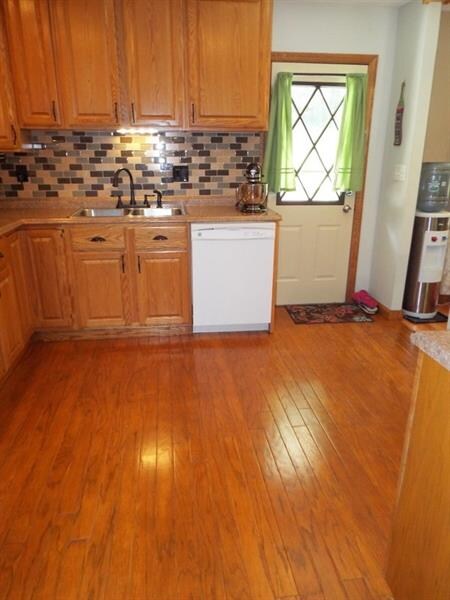 Hard wood flooring in kitchen.
