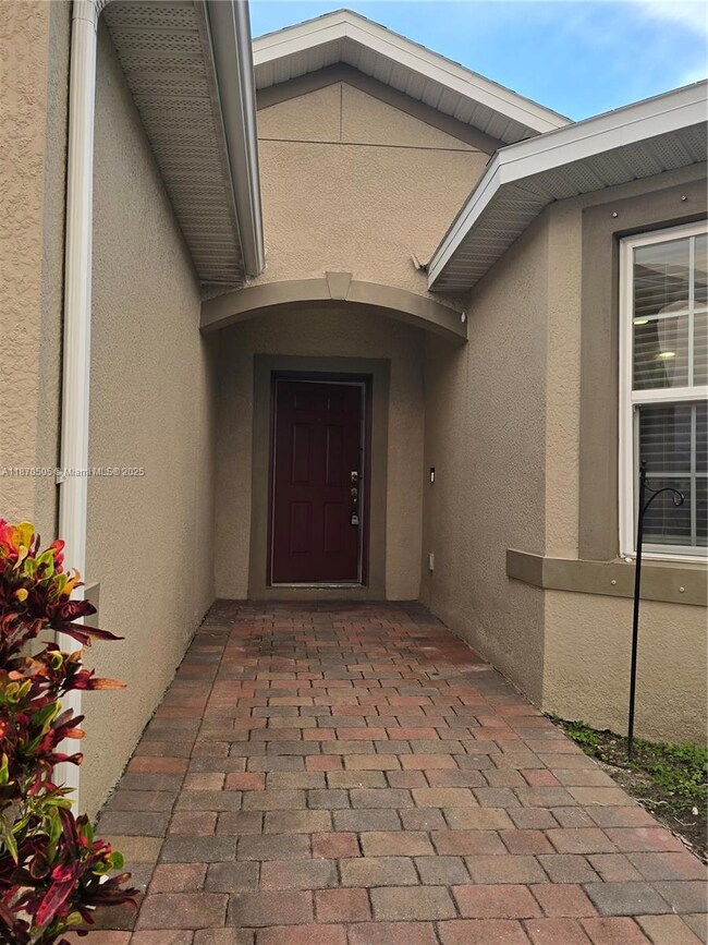 10884 Marble Brook Blvd, Lehigh Acres, FL 33936 - photo 3