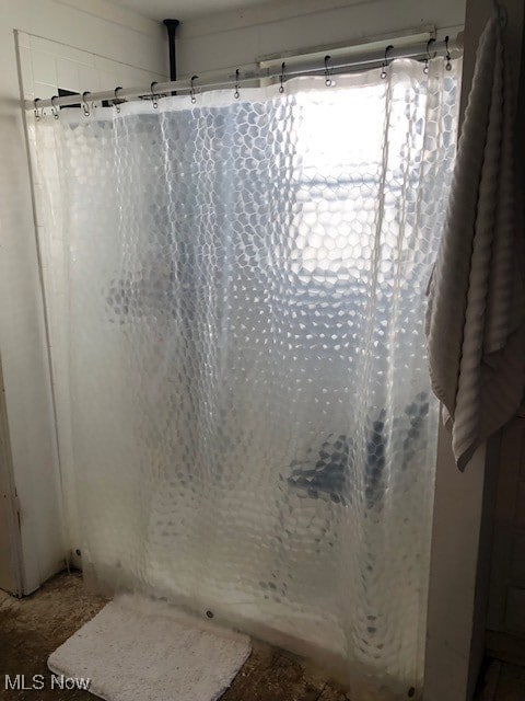 Bathroom featuring a stall shower