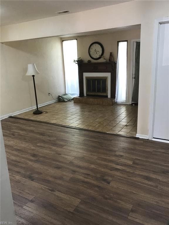 1st Floor  Showing DEN, NEW VPL FLOORING, FIREPLACE