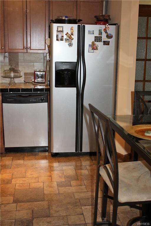 Kitchen with Beautiful Tile Floor and Stainless St