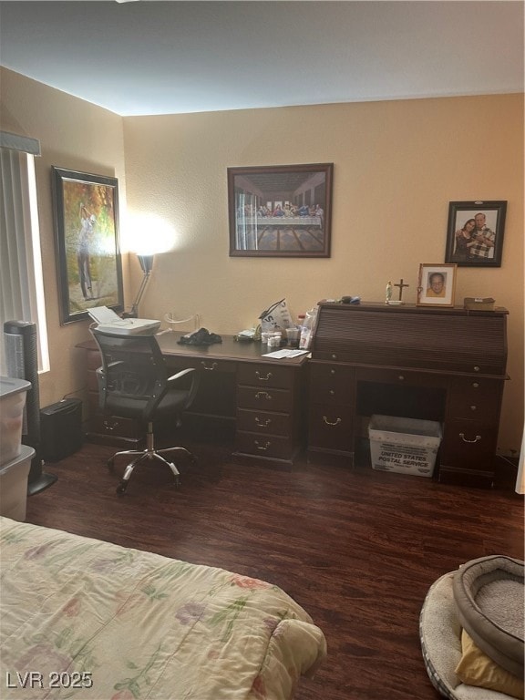 Bedroom featuring dark wood-style floors