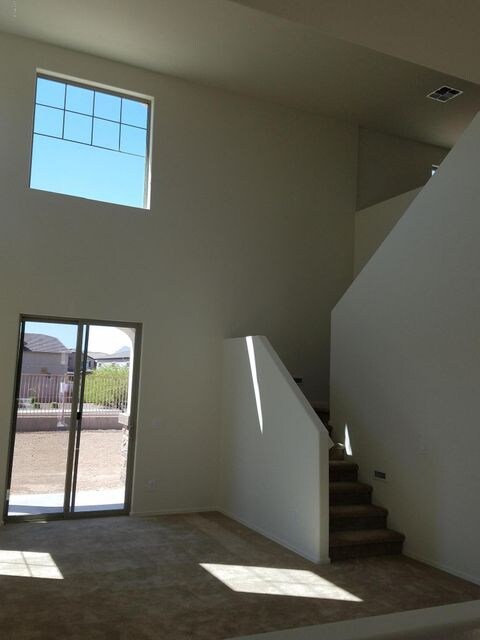 Greatroom and stairs to loft