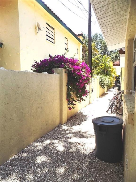 Rear of building to store trash cans, bicycles