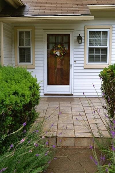 32x10 Front Entrance Tiled Concrete Patio