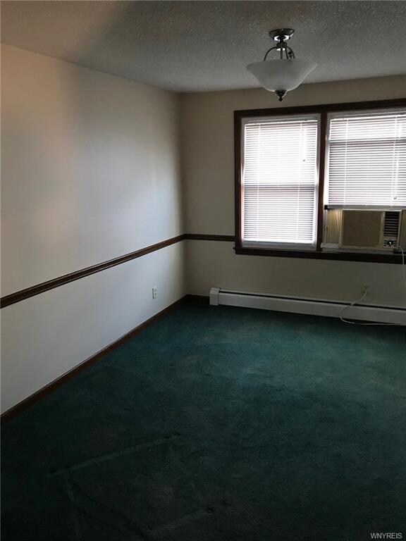 Formal Dining Room between Living Room and Kitchen