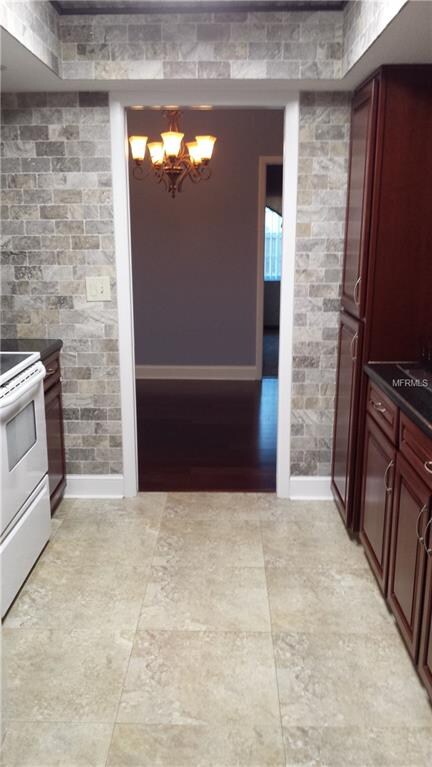 KITCHEN WITH TRAY CEILING WITH ENTRY TO DINING ROO