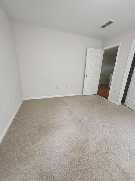 Unfurnished bedroom featuring carpet