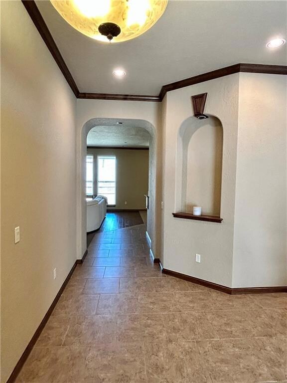 Tile entry with lighted display niche and stained 