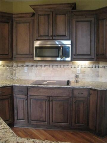 Custom cabinetry not only offers abundant storage, but beautiful aesthetic appeal. This modern kitchen is a cook's dream. 