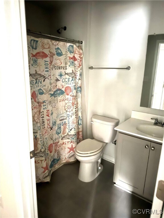 Full bathroom featuring vanity and a shower with c