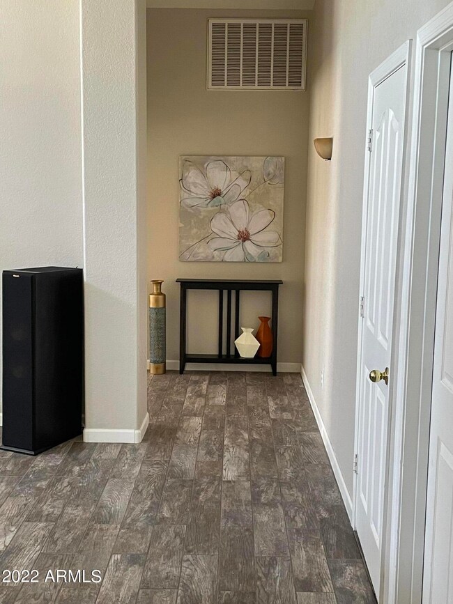 hallway to split master suite