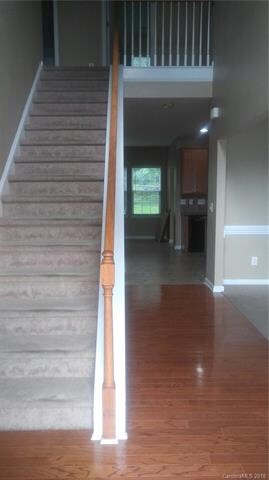 Foyer with hardwood floors