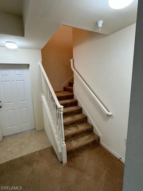 Stairway to upper level atrium and two additional 