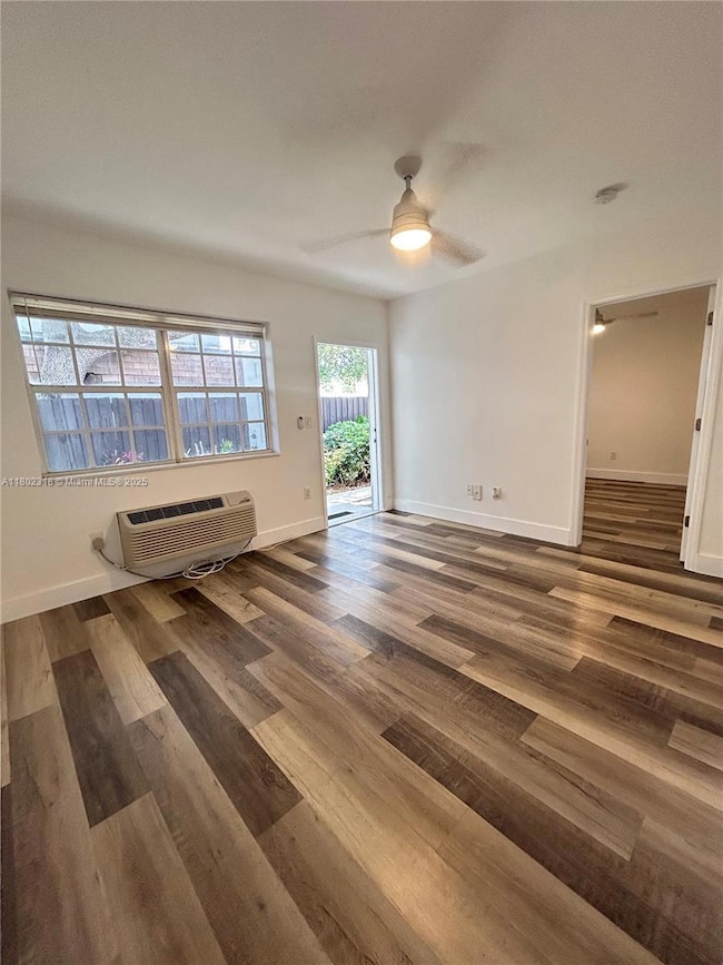 Living Room showing main entrance and on the right the bedroom