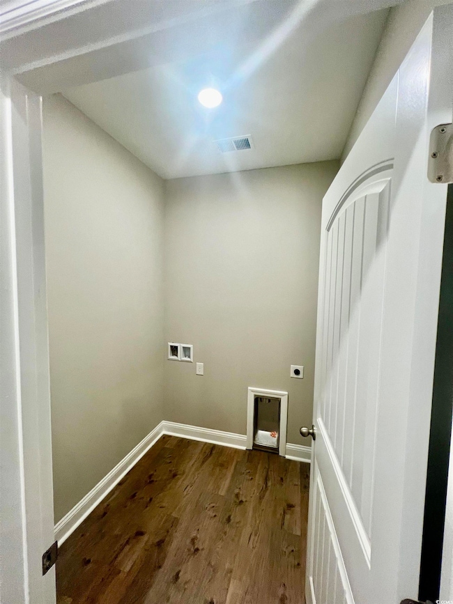 Laundry room with hookup for an electric dryer, ho