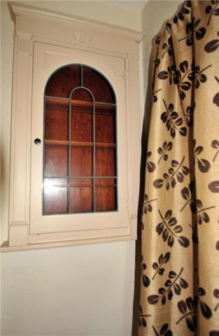 Built in Curio cabinet to the side wall from the f