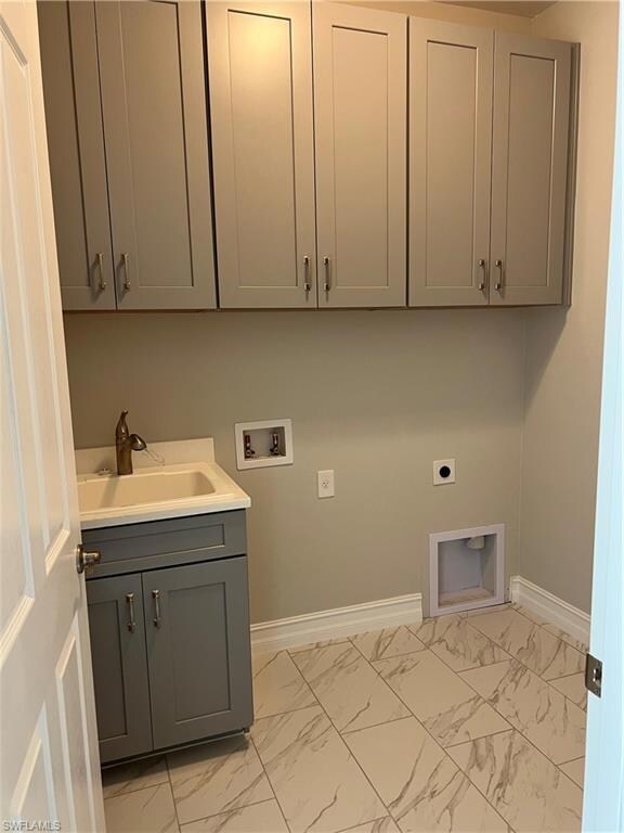 Laundry area with washer hookup, electric dryer ho