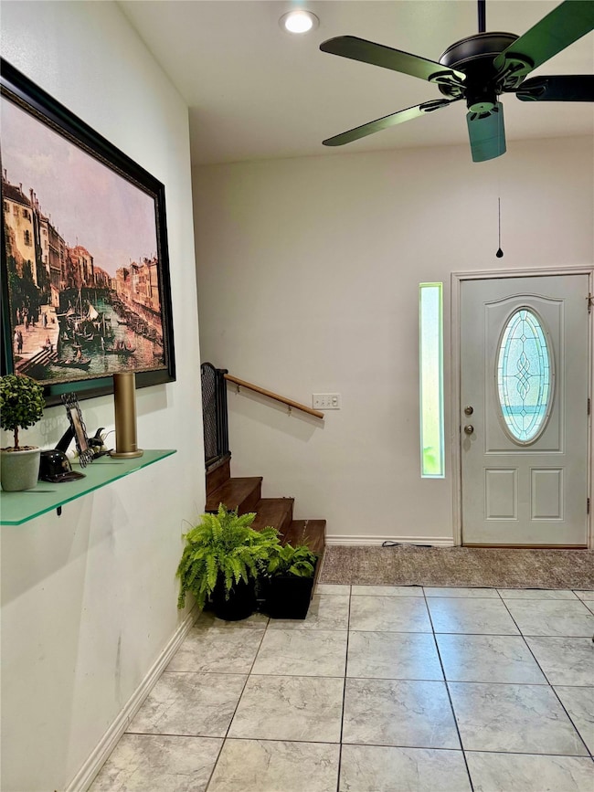 Main entry into the large mudroom showing the stai