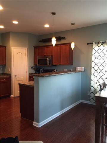 Kitchen has upgraded lighting and stainless steel 