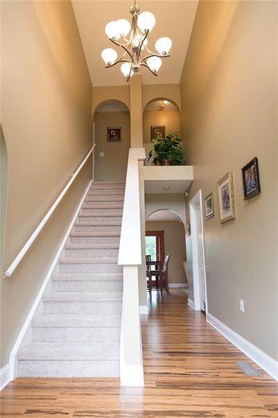 Neutral decor and beaming hardwood floors in almos