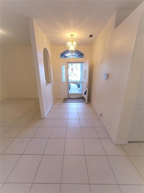 Entry way with screen door.