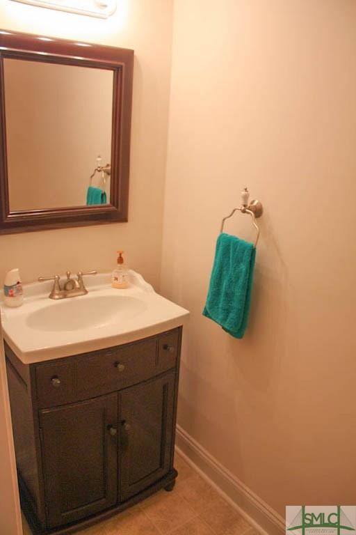 1 of 2 half bathrooms located in each apartment.