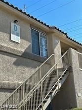 View of property exterior featuring stairs