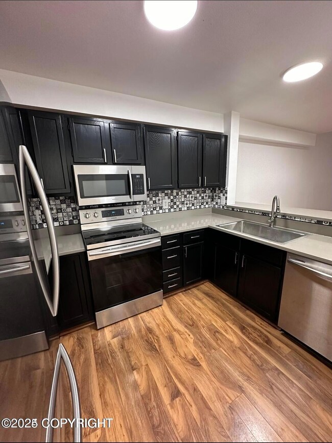 10212 Jamestown Dr unit 102D, Anchorage, AK 99507 - photo 2