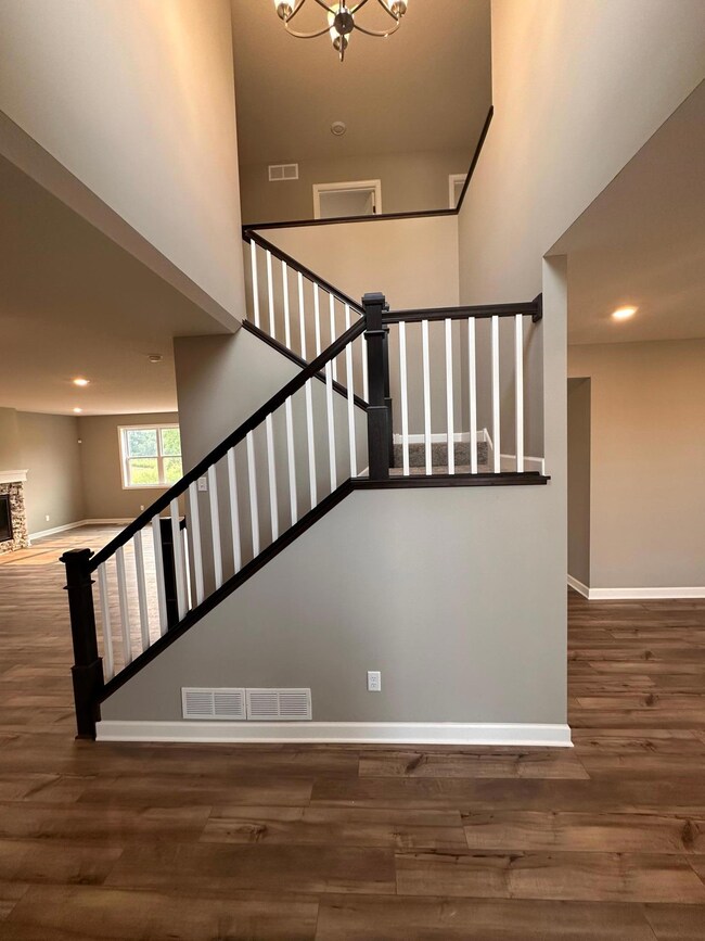 The front two story foyer is the ultimate WOW factor. Views of the entire main level right when you walk in.