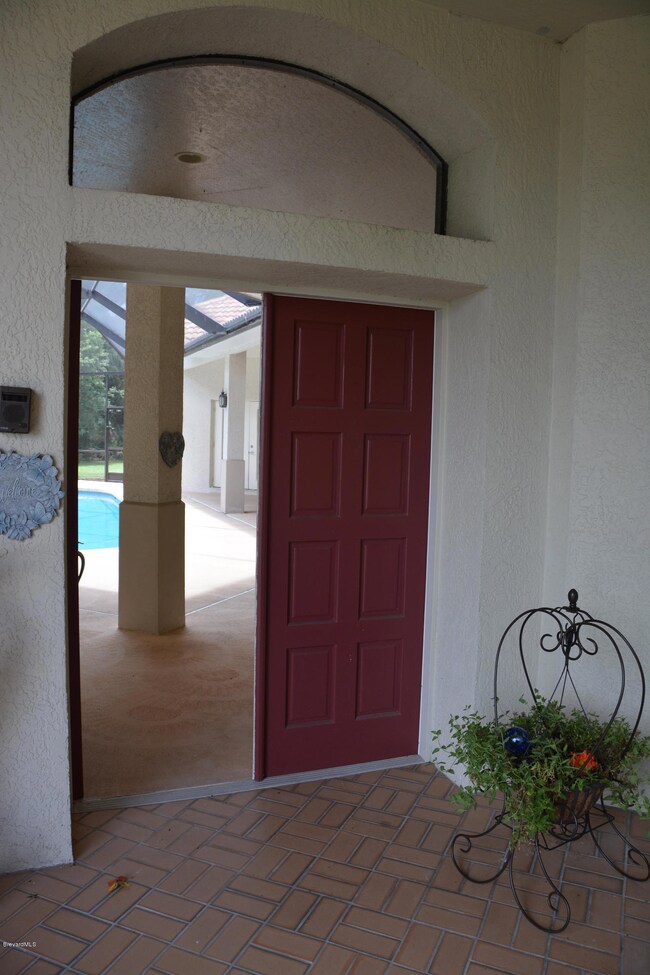 Front door opens to courtyard