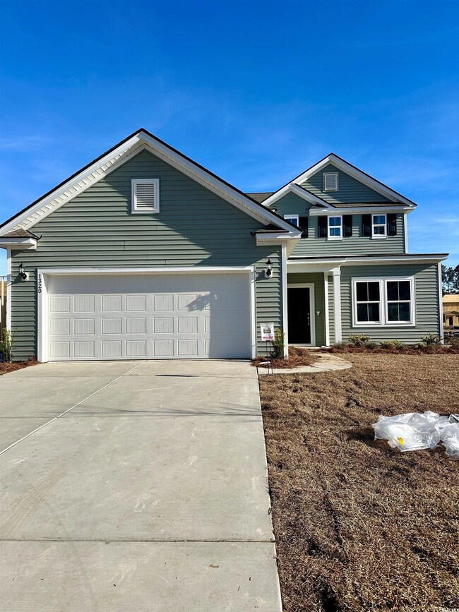 View of front of home with a garage