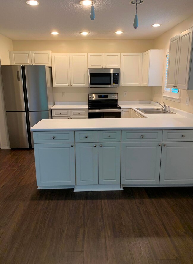 Kitchen with New Floor and Appliances