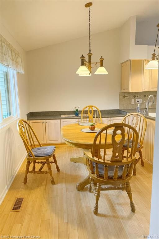 Dining space featuring light wood-style floors