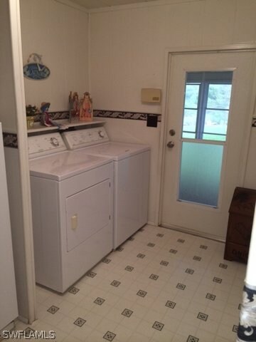 Laundry area with access to outside lanai.