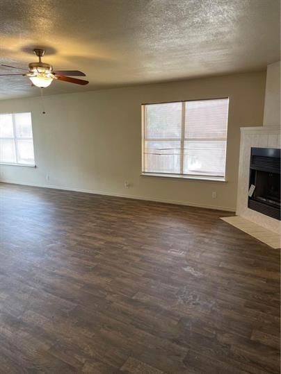 Unfurnished living room featuring dark wood finis