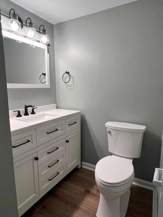 Half bath downstairs off hall