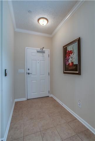 Foyer with tiled floor