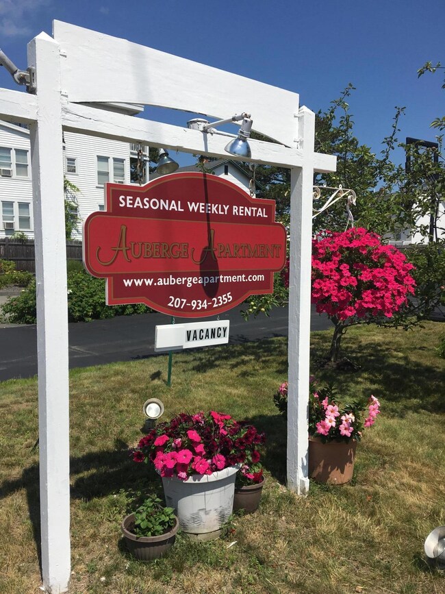 Auberge Apartment street sign