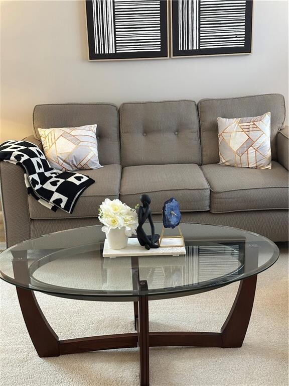 Living area featuring carpet floors