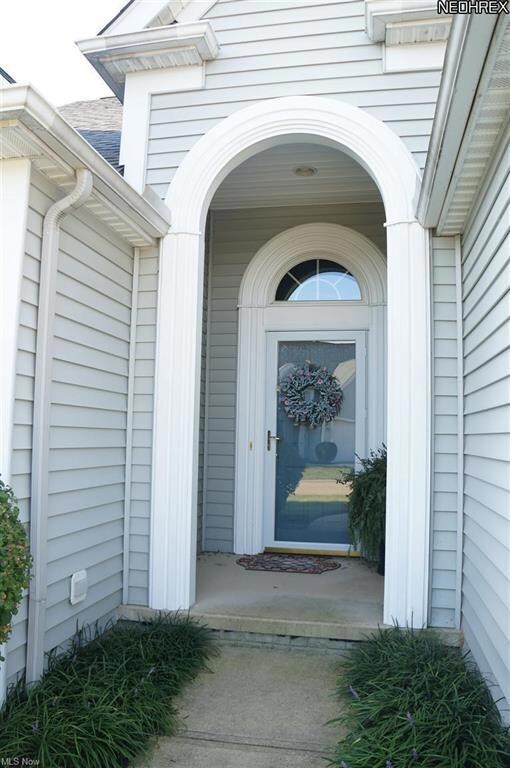 A cozy alcove and porch greet you as you walk up t
